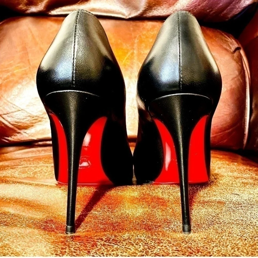 Christian Louboutin presenting iconic